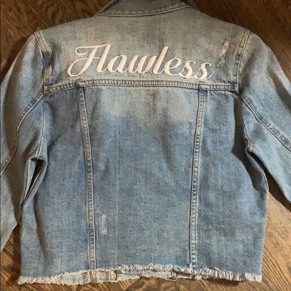 Jean jacket. Worn once. GREAT CONDITION.